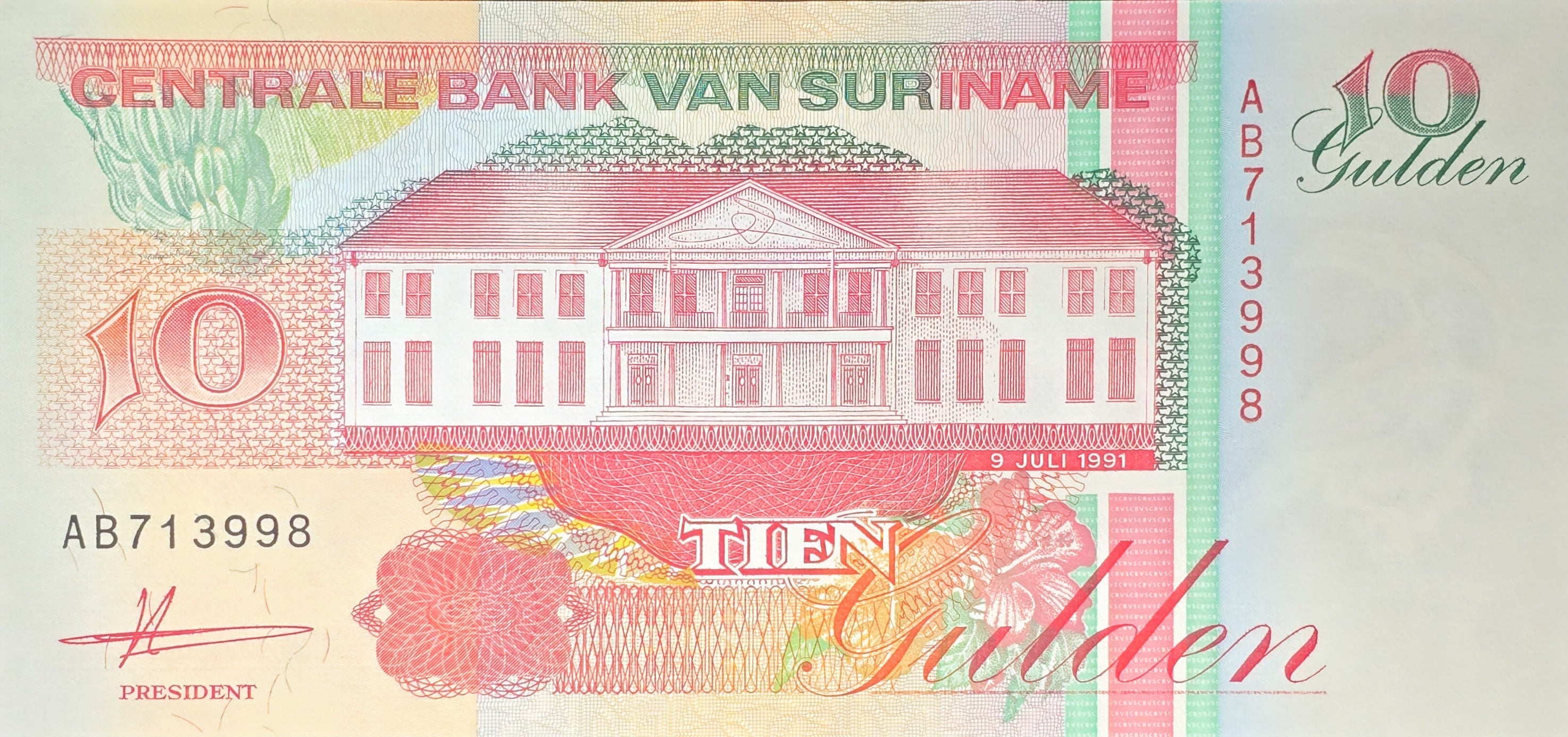 SURINAME 10 Gulden, P137a, UNCIRCULATED, 1991; features a Toucan
