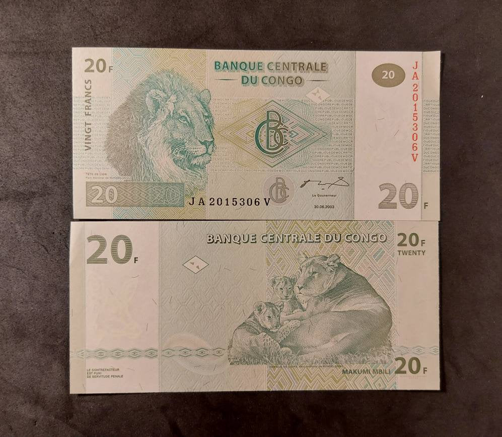 Congo 20 Francs Banknote; P-94 from 2003; Very Fine (VF); Beautiful note features Lions Head and Lion Pride on back