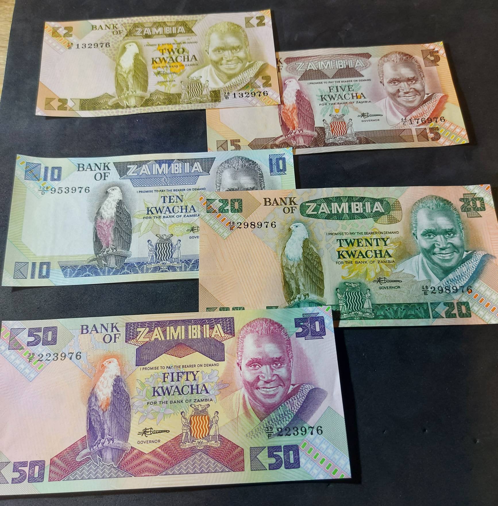 Zambia 1980's "Fish Eagle" UNIQUE 5 Note Banknote Set; Same last 3 DIGIT SERIAL number; 2, 5, 10, 20 and 50 Kwatcha; All Uncirculated
