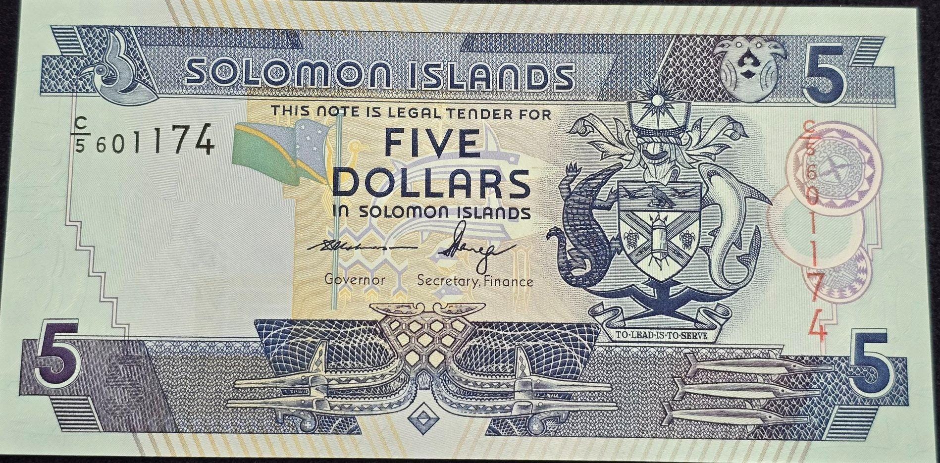 SOLOMON ISLANDS 5 Dollars, P-26, UNCIRCULATED, 2006; features Long boats and a hut