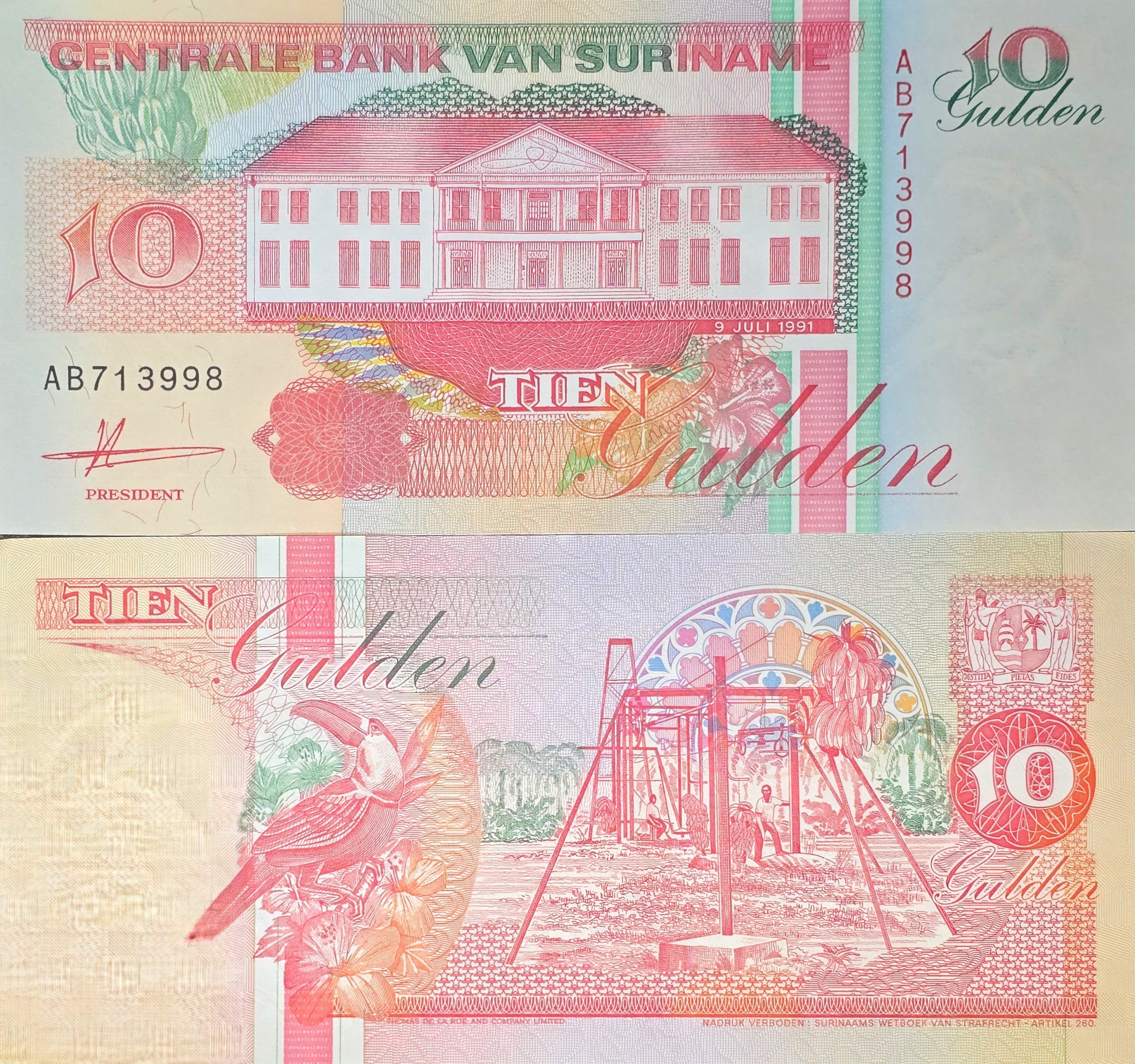 SURINAME 10 Gulden, P137a, UNCIRCULATED, 1991; features a Toucan