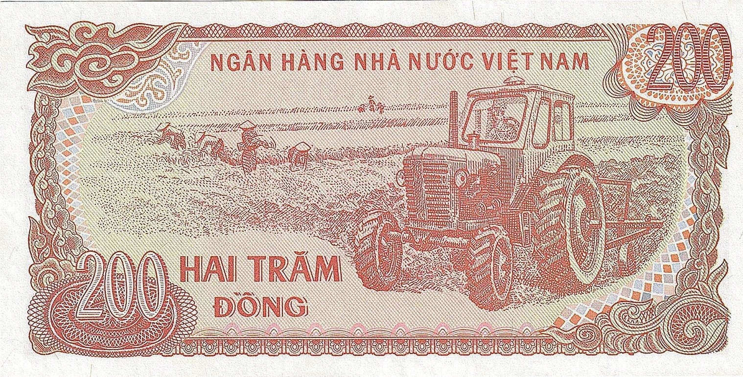 VIET NAM 200 Dong Banknote; P - 100c; UNCIRCULATED from 1987; Features Ho Chi Min & Tractor