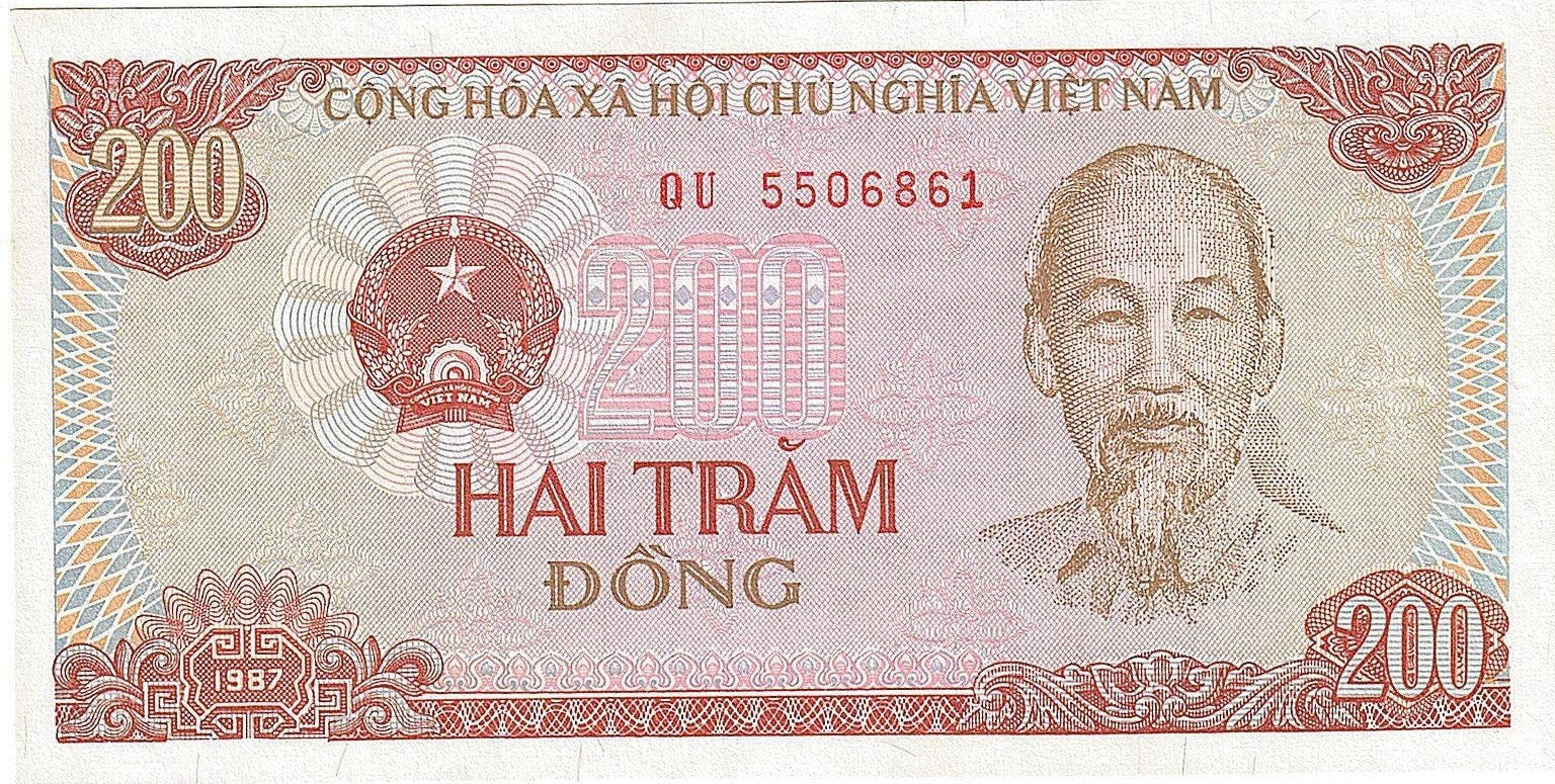 VIET NAM 200 Dong Banknote; P - 100c; UNCIRCULATED from 1987; Features Ho Chi Min & Tractor