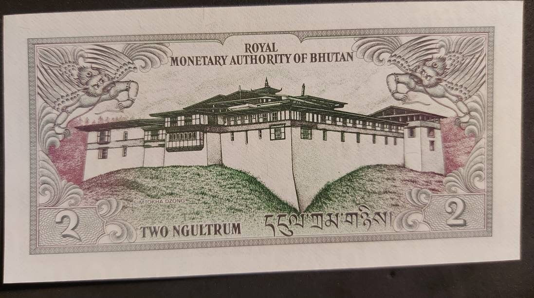BHUTAN 2 Ngultrum; P-13, 1986, UNCIRCULATED; features Multiple Dragons