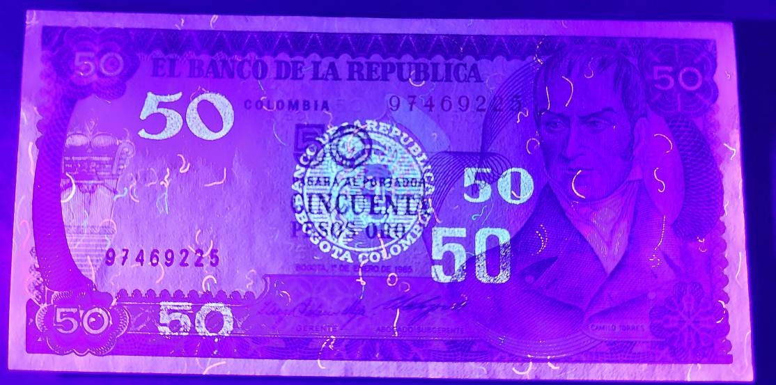 COLOMBIA 50 Peso Oro Banknote; P-425a; Bank Fresh UNCIRCULATED from 1985; Amazing UV; features a Beautiful Condor