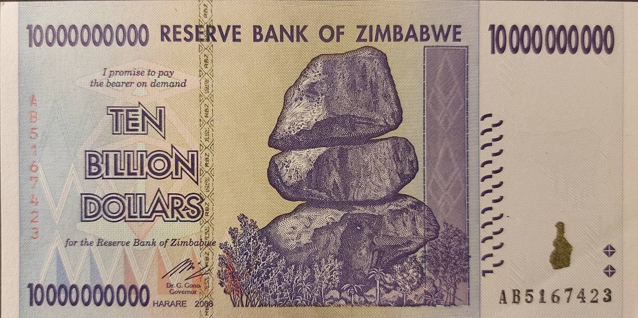 ZIMBABWE 10 Billion Dollars; UNCIRCULATED; P-85, 2008; featuring the Chiremba Balancing Rock and Water Dam; Miner