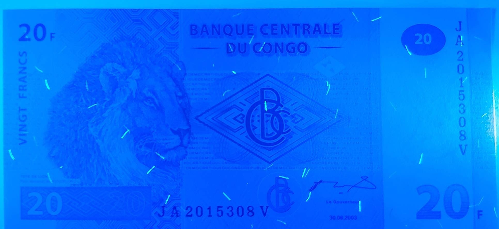 Congo 20 Francs Banknote; P-94 from 2003; Very Fine (VF); Beautiful note features Lions Head and Lion Pride on back