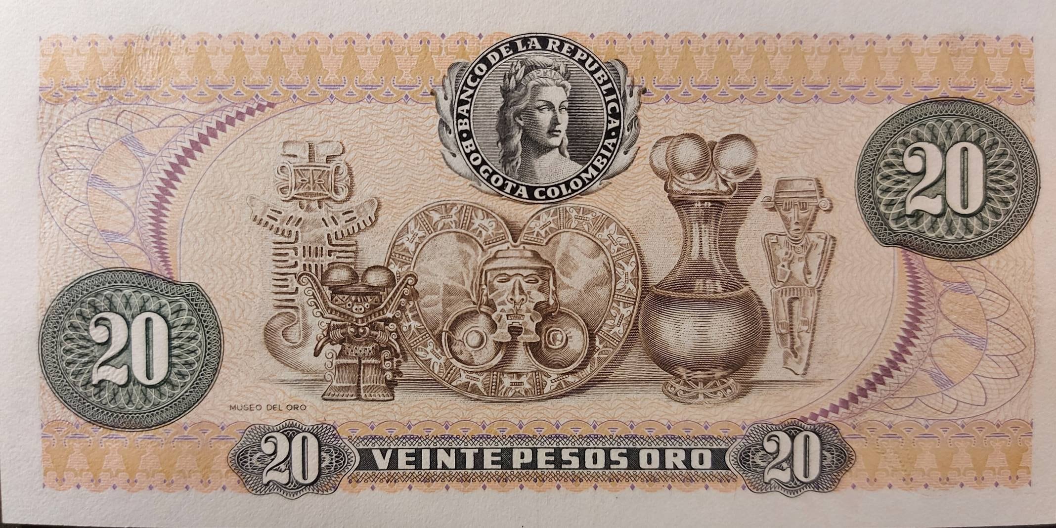 COLOMBIA 20 Peso Oro Banknote; P-409d; UNCIRCULATED from 1982; features Gold trinkets