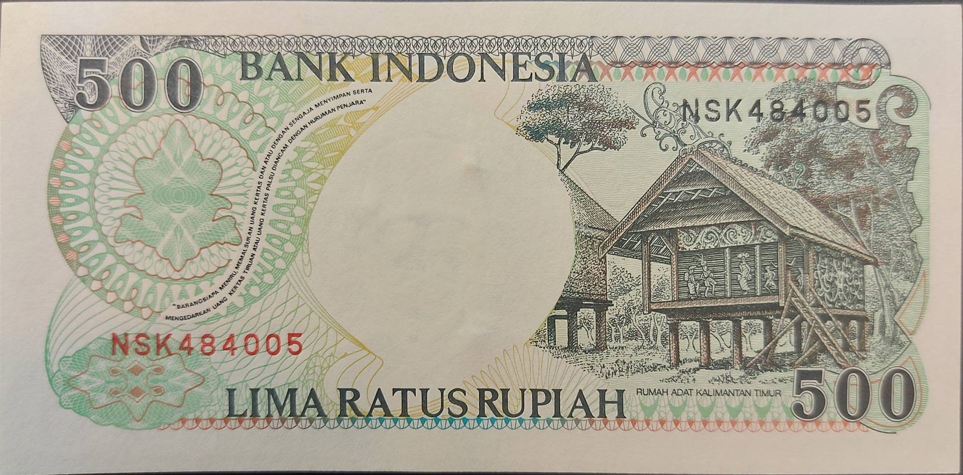 INDONESIA 500 Rupiah, P- 128h; UNCIRCULATED, 1999; features an Orangutan; Native Huts at back