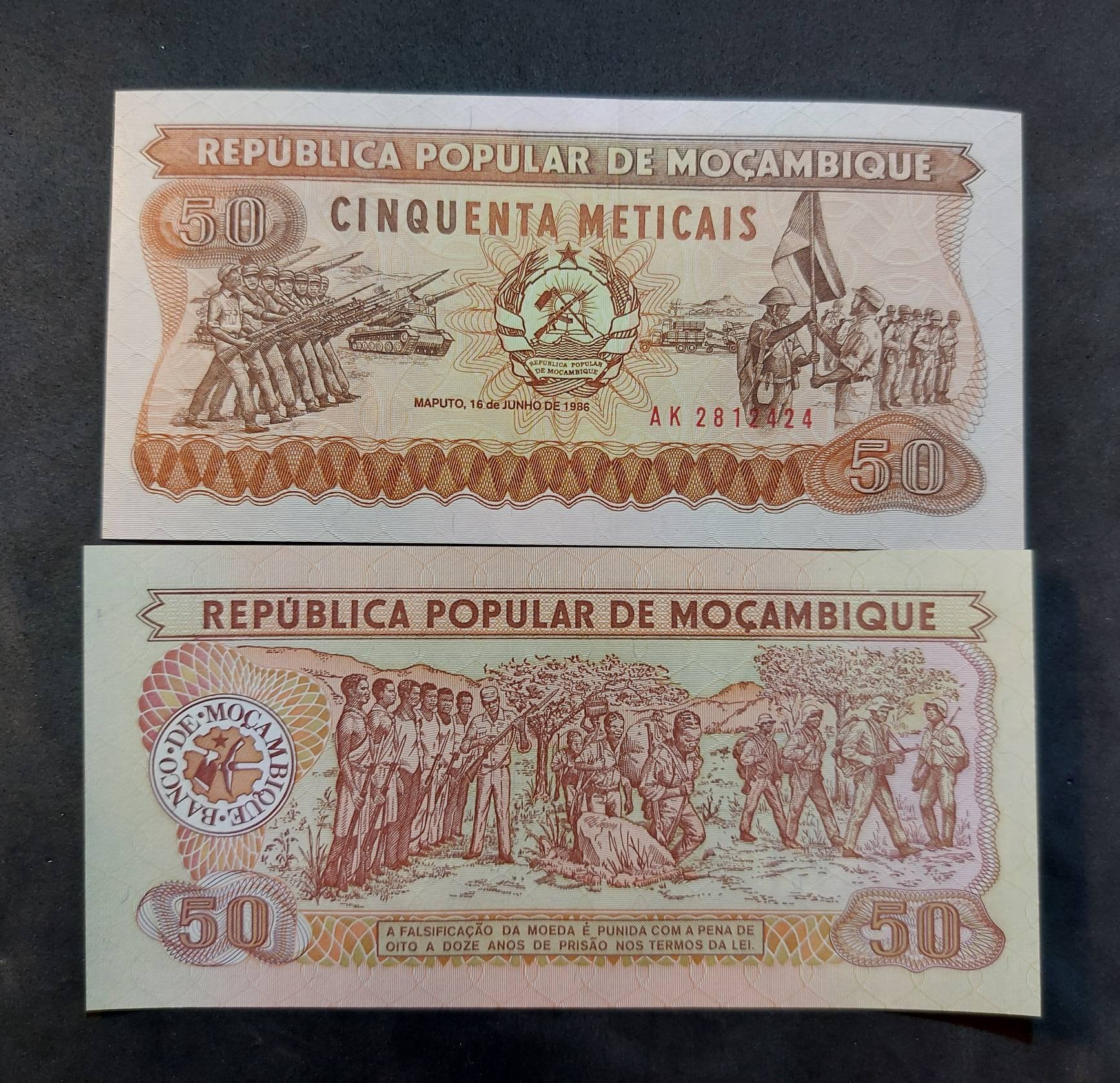 MOZAMBIQUE 50 Meticais Banknote; P -129b; UNCIRCULATED; 1986; Features a Flag ceremony