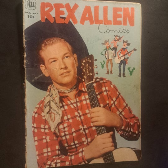 REX ALLeN #4: Rustlers of the Pacific from 1952; A Silver Age Dell Comic; (VG); Rex Allen Photo Cover and Back with his Horse