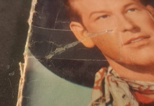 REX ALLeN #4: Rustlers of the Pacific from 1952; A Silver Age Dell Comic; (VG); Rex Allen Photo Cover and Back with his Horse