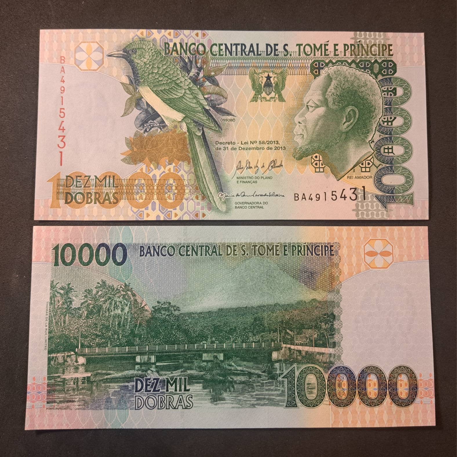 Saint Thomas & Prince 10000 Dobras, P66d; Uncirculated, 2013; Features an Emerald Cuckoo