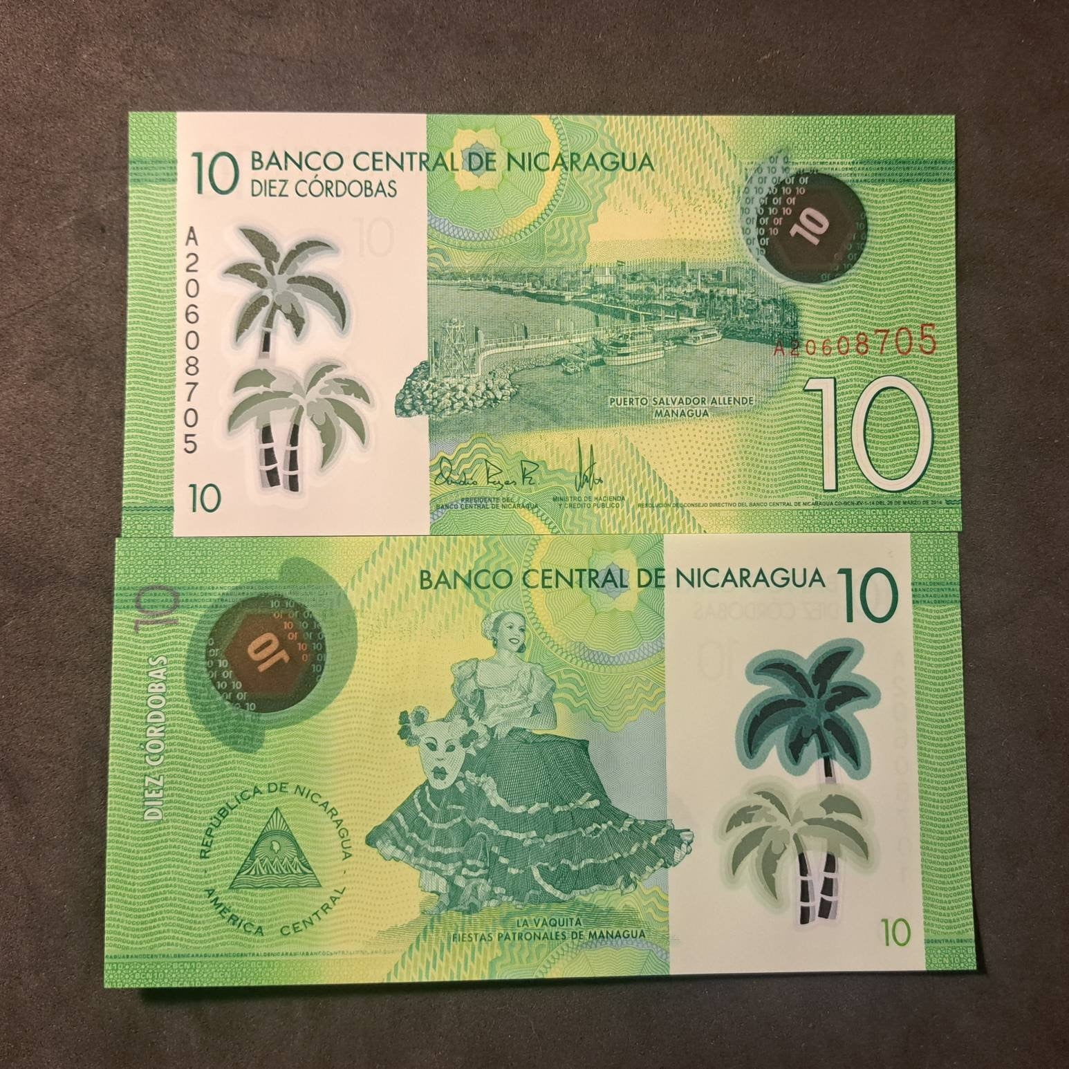 NICARAGUA 10 Cordobas, P-209a; UNCIRCULATED, 2014; Polymer, features a Port Scene