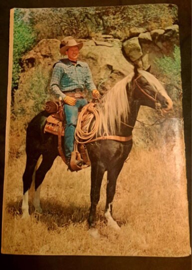 REX ALLeN #4: Rustlers of the Pacific from 1952; A Silver Age Dell Comic; (VG); Rex Allen Photo Cover and Back with his Horse