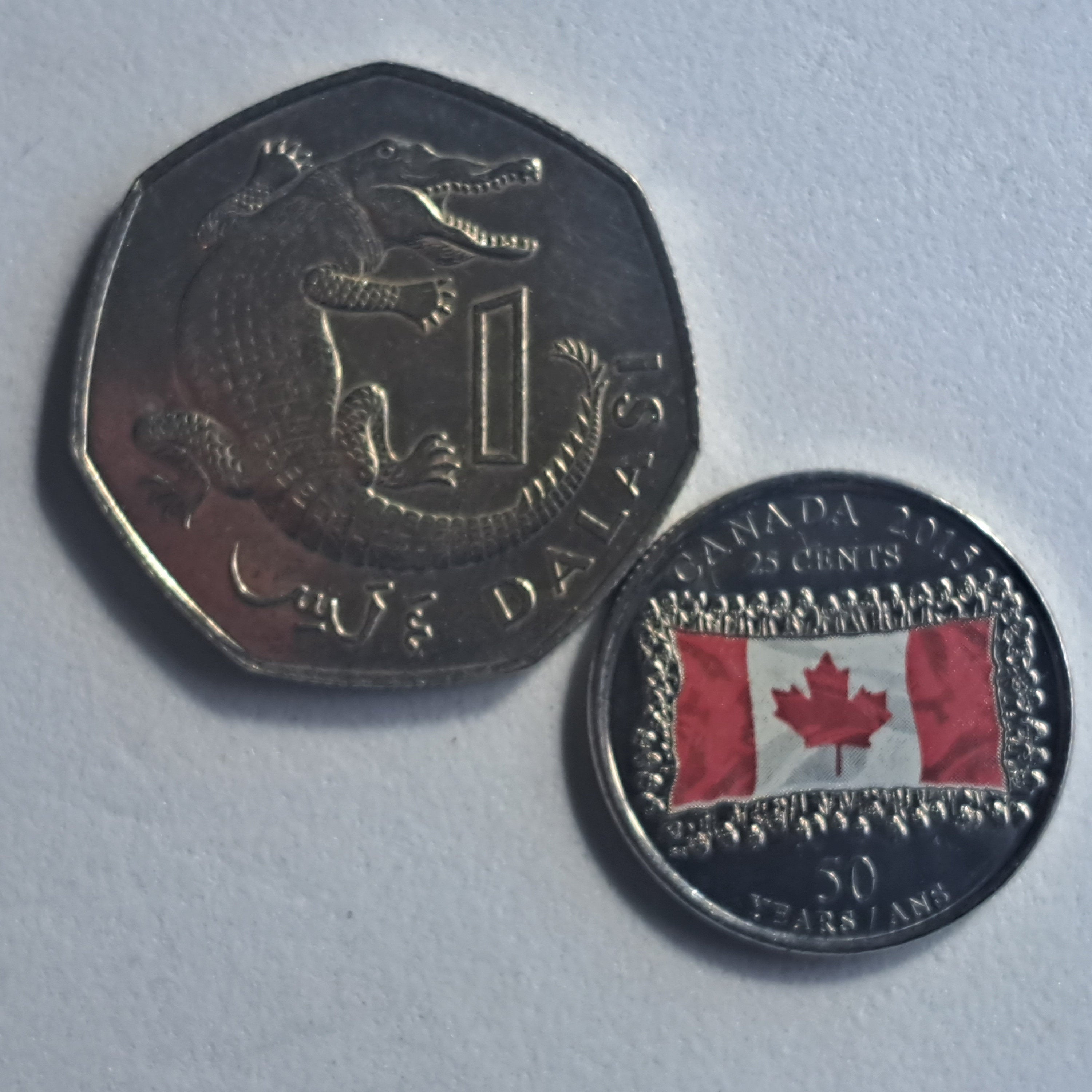 GAMBIA 10 Dalasi Coin; BU from 1987; KM29; features the Slender-Snouted Crocodile