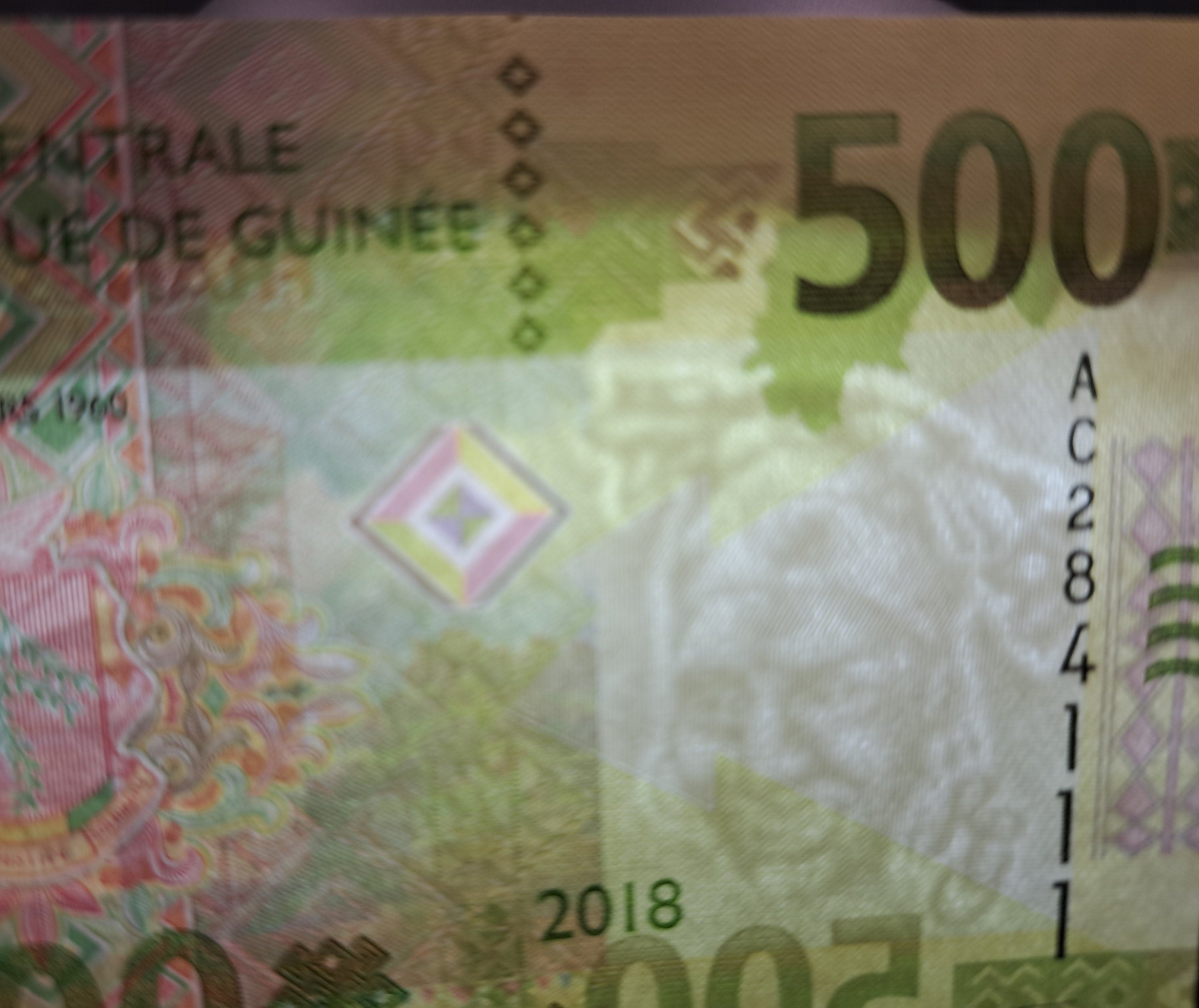 GUINEA 500 Francs Banknote B-341.5a from 2018; Mining and Woman featured