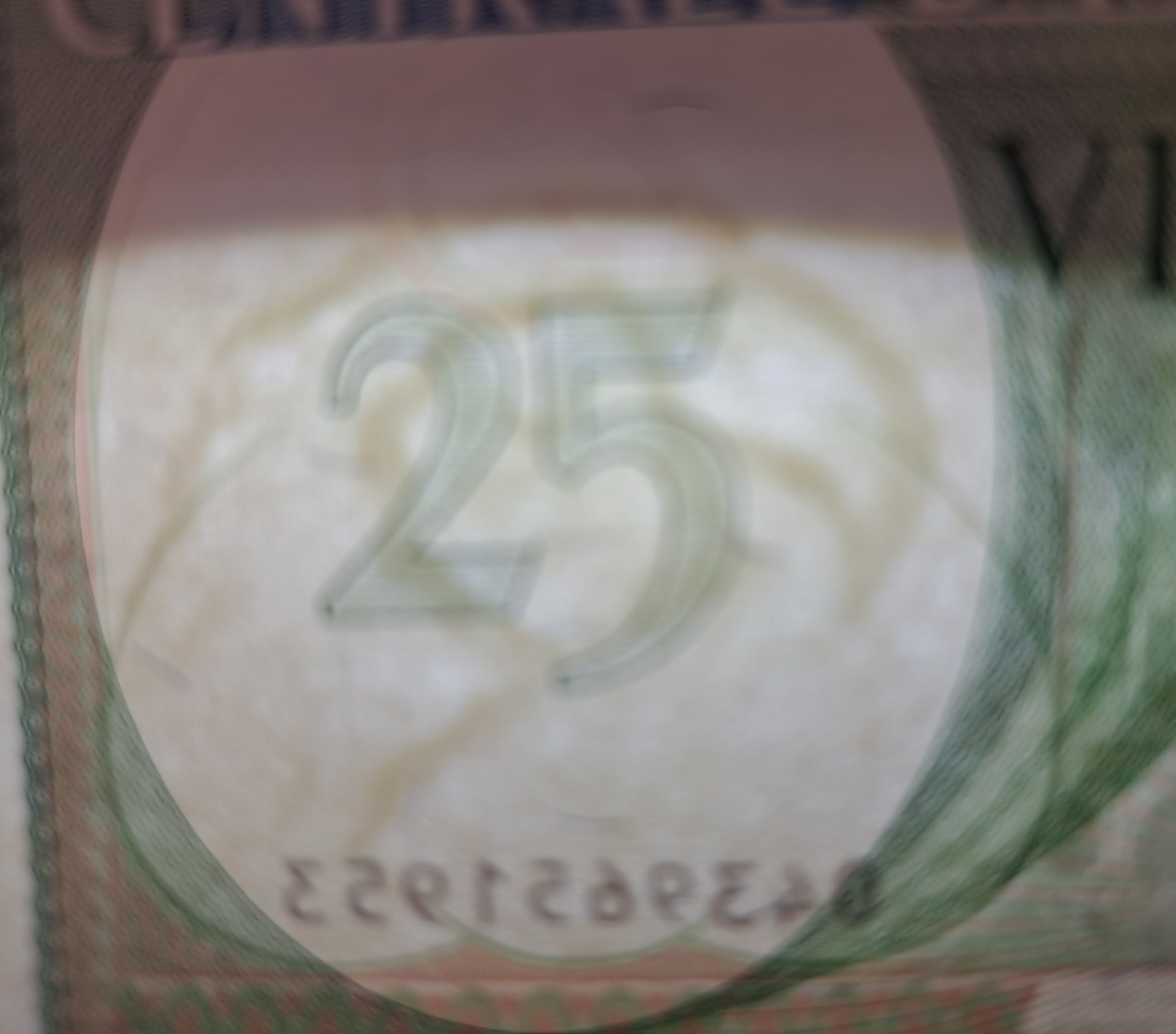 SURINAME 25 Gulden Banknote, P- 127b, UNCIRCULATED, 1985; features a woman and soldiers