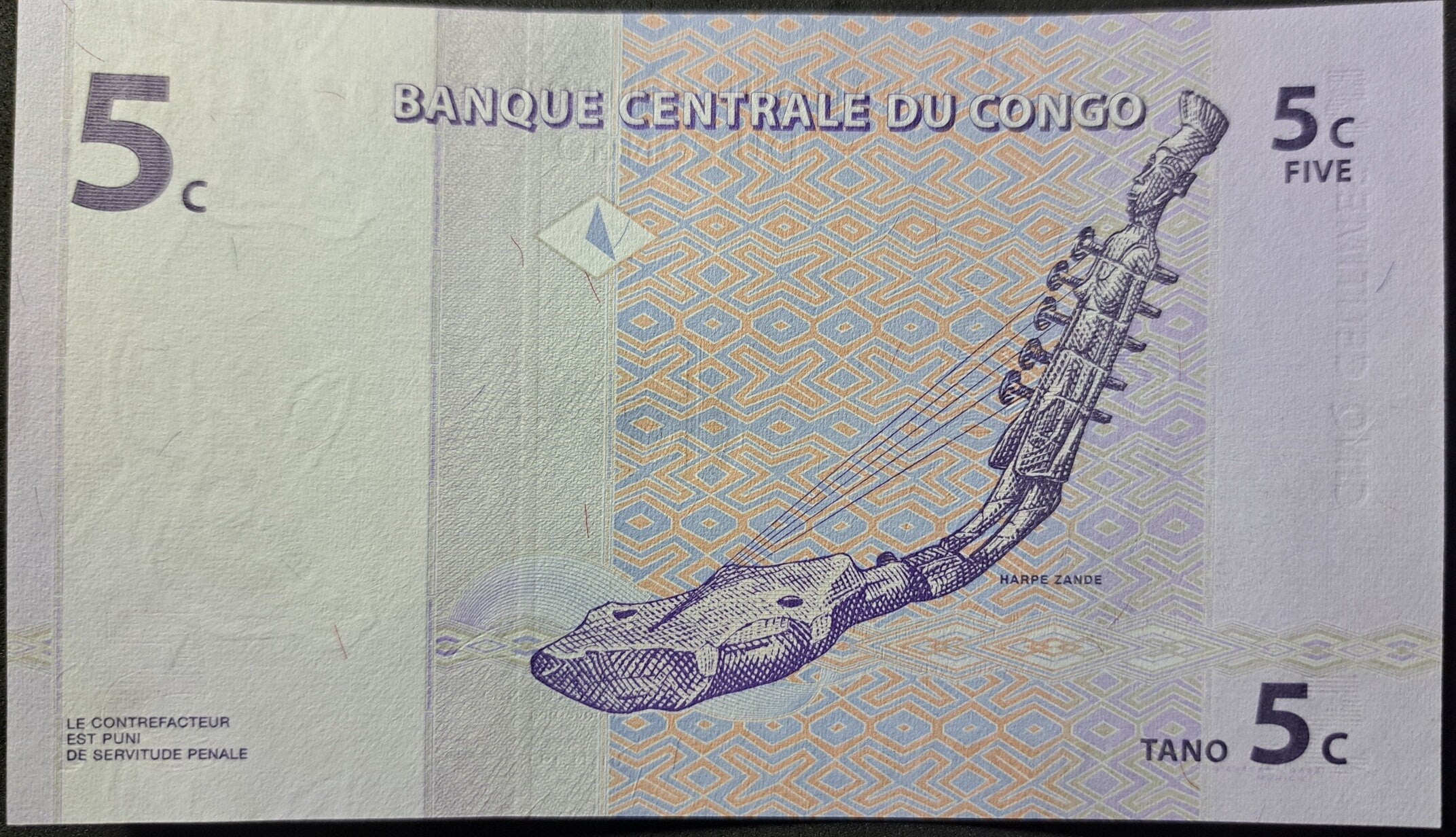 Congo 5 Centime Banknote, P-81a; UNCIRCULATED from 1997; features a Zande Harp