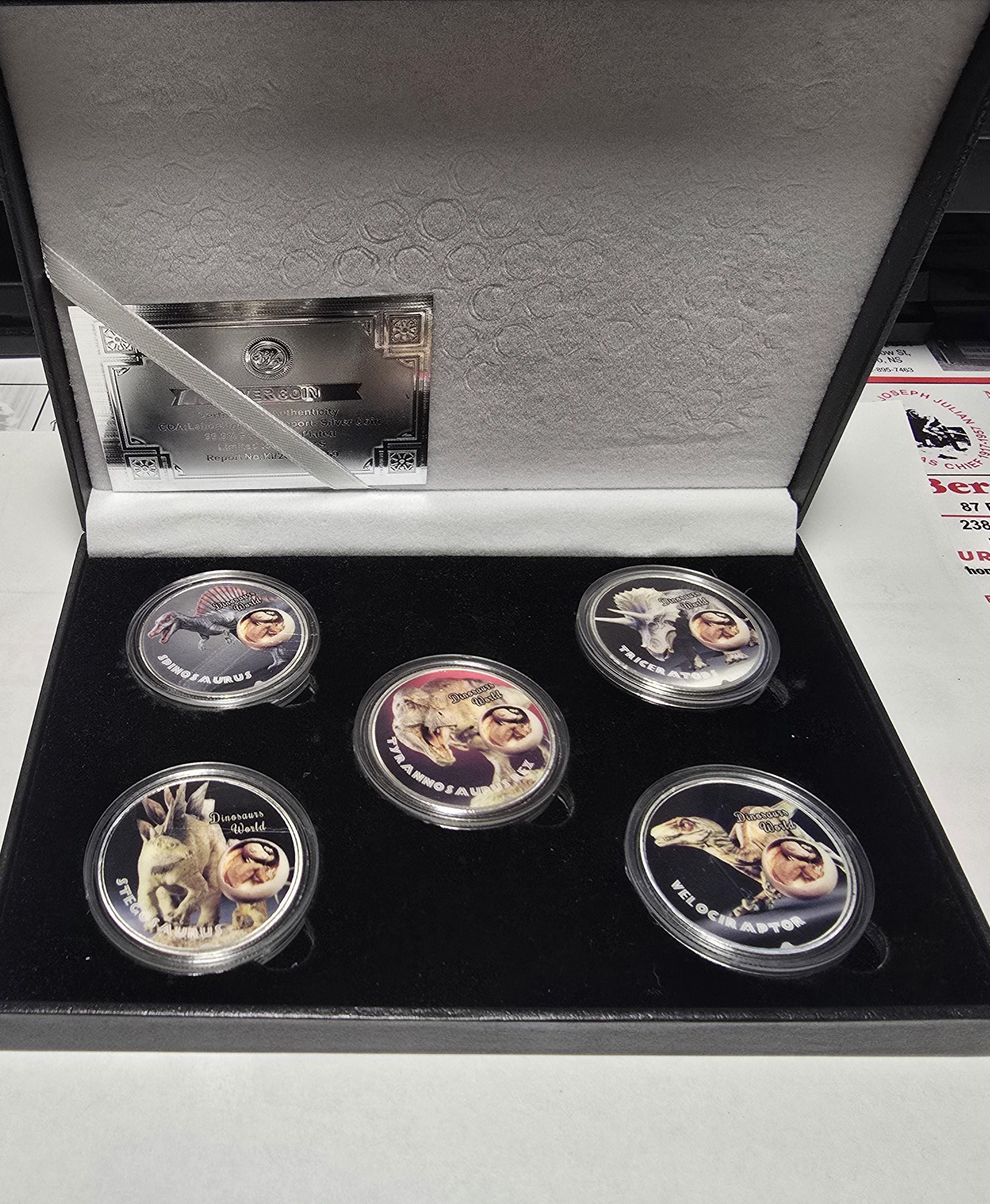 DINOSAUR - Silver Plated Fantasy Coin Set, with COA, Beautiful Coins and Design in a leather bound Case. Each Coin also in a cased holder.