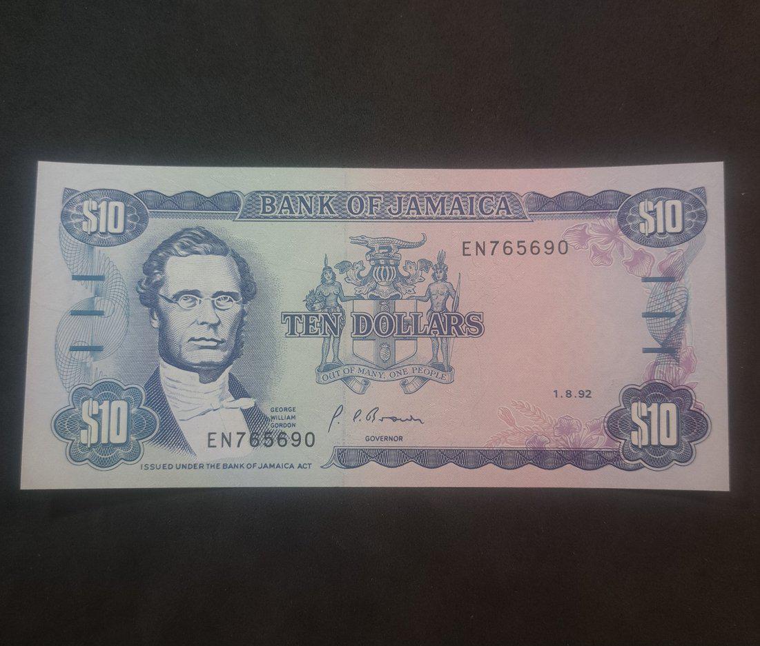 JAMAICA 10 Dollars Banknote; P-71d; UNCIRCULATED from 1992; featuring Bauxite Mining Scene