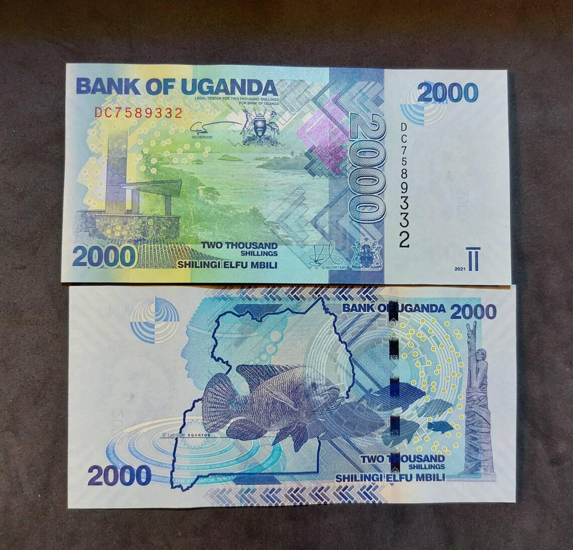 UGANDA 2000 Shillings; B-155f; UNC; 2021; Tilapia Fish and the Nile River