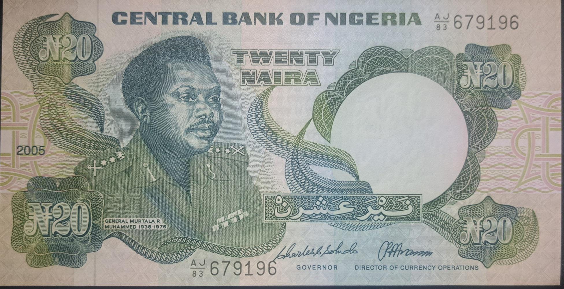 NIGERIA 20 Naira Banknote, P- 26i, UNC from 2005; features Arms with Horses