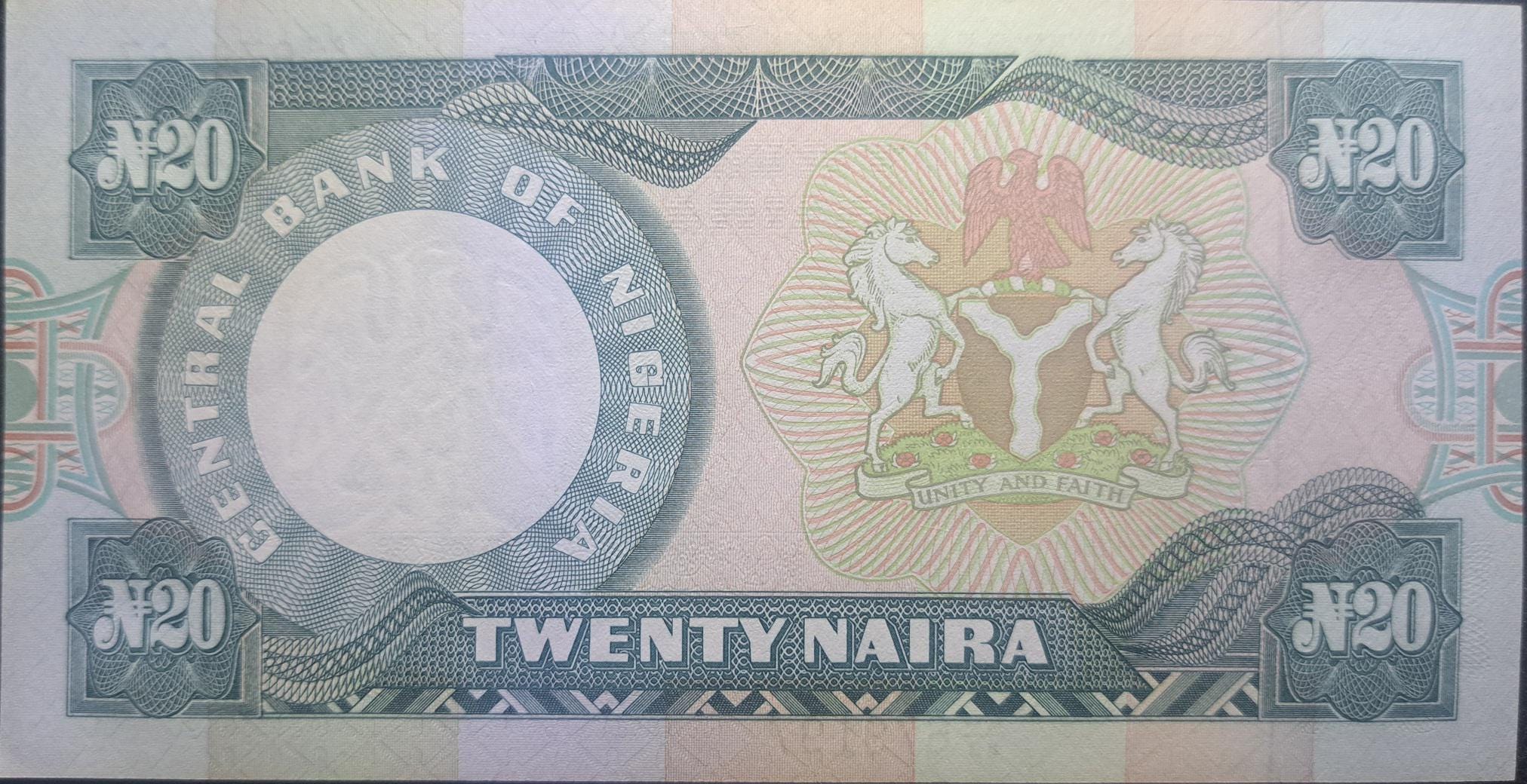 NIGERIA 20 Naira Banknote, P- 26i, UNC from 2005; features Arms with Horses