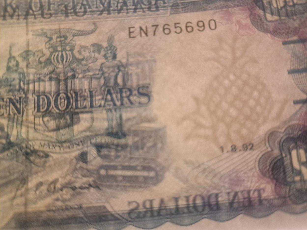 JAMAICA 10 Dollars Banknote; P-71d; UNCIRCULATED from 1992; featuring Bauxite Mining Scene