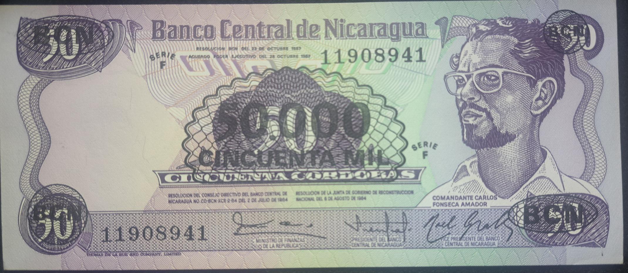 NICARAGUA 50000 Cordobas Overprint Banknote; P-148; UNCIRCULATED, 1987; features Marching troops
