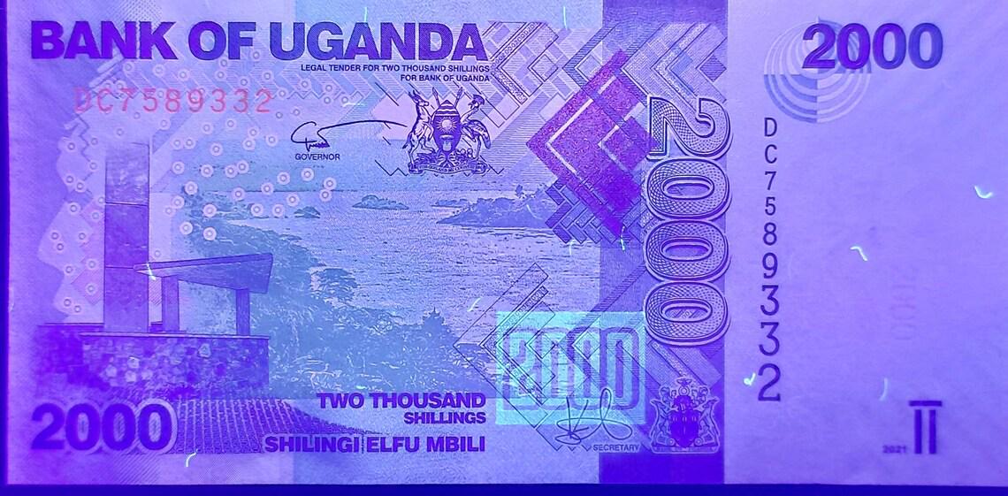 UGANDA 2000 Shillings; B-155f; UNC; 2021; Tilapia Fish and the Nile River