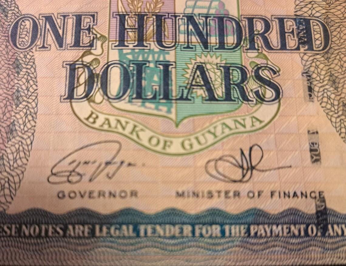 GUYANA 100 Dollars, B-114d, 2022, New Signatures; UNCIRCULATED; Cathedral; Map