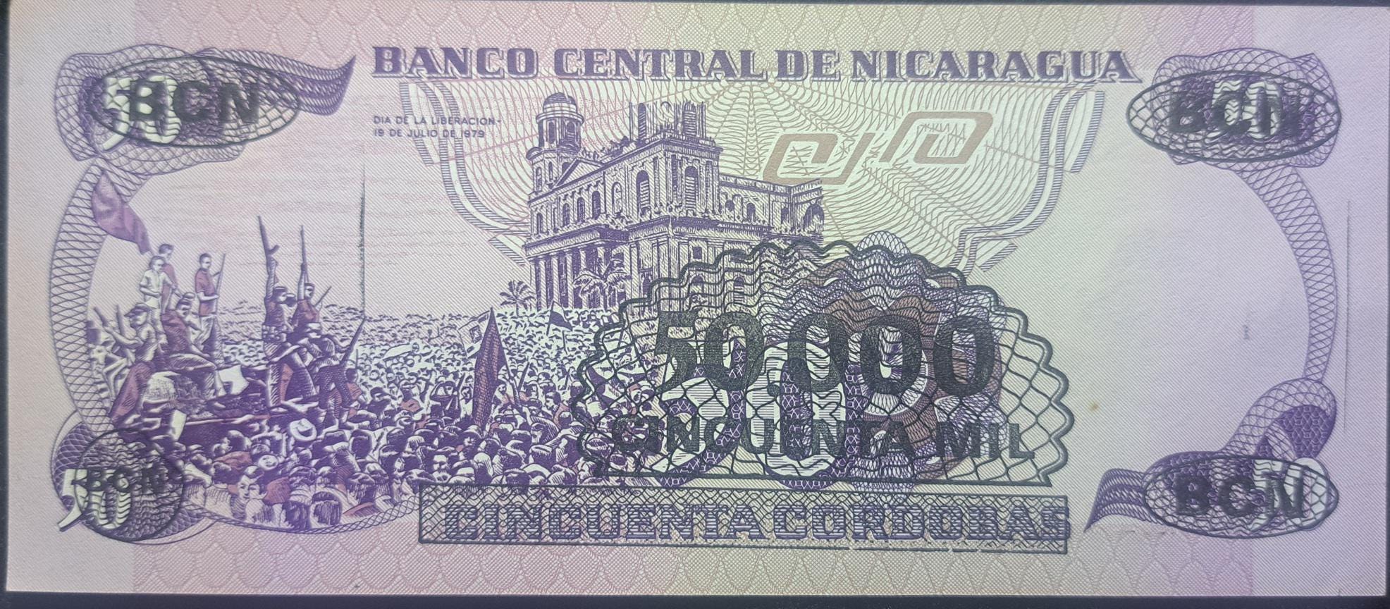 NICARAGUA 50000 Cordobas Overprint Banknote; P-148; UNCIRCULATED, 1987; features Marching troops