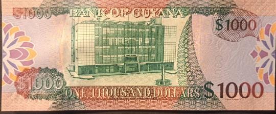 GUYANA 1000 Dollars, B-120a, UNCIRCULATED, 2019; features public Buildings, New Signatures