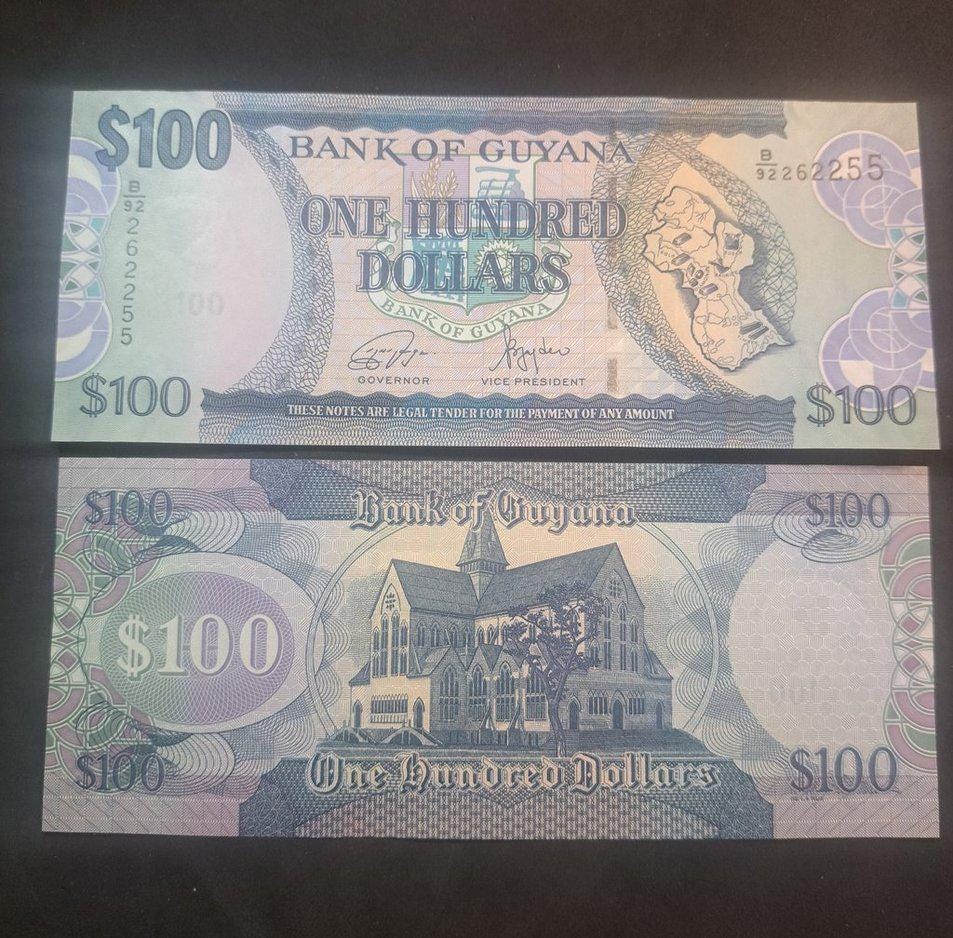 Guyana 100 Dollars, P-36c, UNCIRCULATED, 2006; features a Church and Map