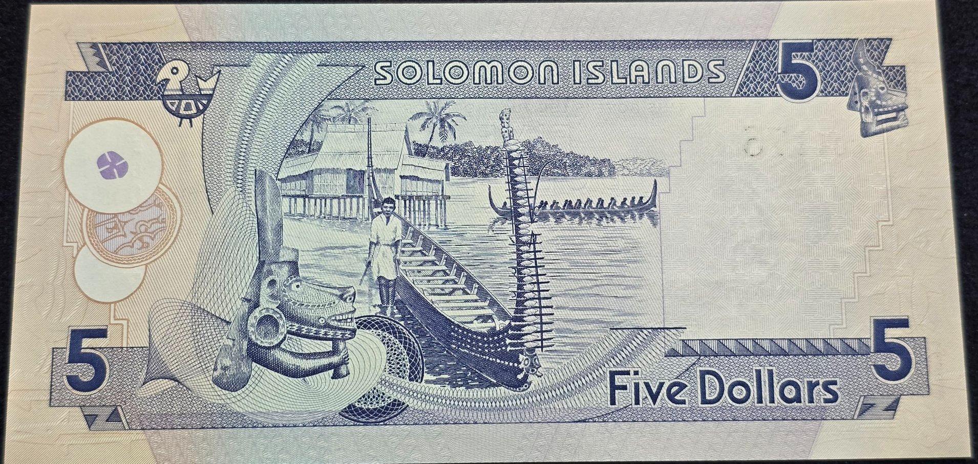 SOLOMON ISLANDS 5 Dollars, P-26, UNCIRCULATED, 2006; features Long boats and a hut