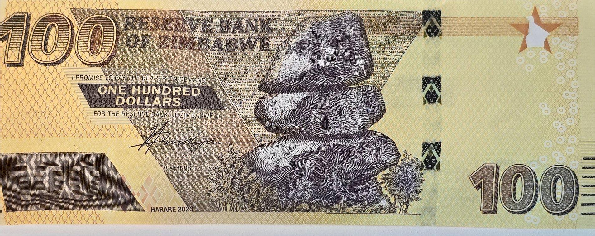Zimbabwe 100 Dollars, B197b, UNCIRCULATED, 2023; features Great Zimbabwe Ruins