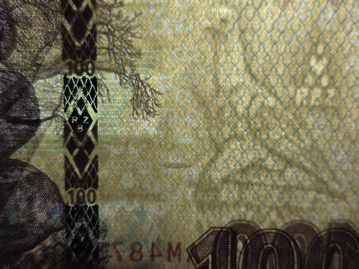 Zimbabwe 100 Dollars, B197b, UNCIRCULATED, 2023; features Great Zimbabwe Ruins
